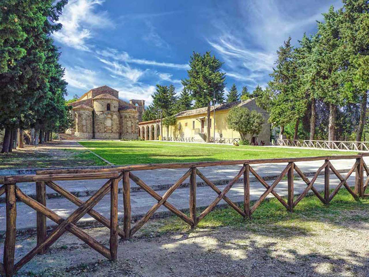 The abbey of Santa Maria del Patire among the trees
